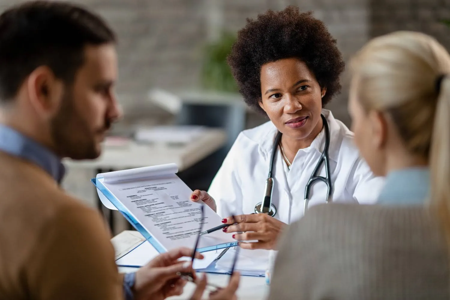 A doctor holding a stethoscope